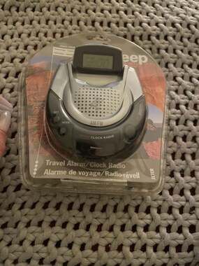 Jeep JXTCR Travel AM/FM Alarm Clock Radio with Light and Earphone Jack